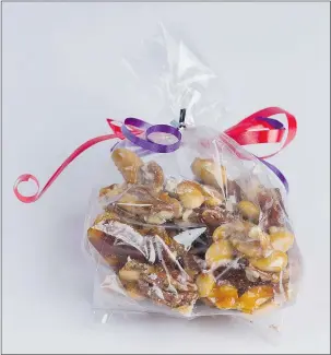  ?? — POSTMEDIA NEWS ?? Give these candied nuts from Ina Garten’s new book Make It Ahead as Christmas gifts or simply enjoy the sweetness yourself.