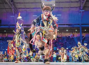  ?? ROBERTO E. ROSALES/JOURNAL ?? Josiah Tsatoke of Norman, Okla., a member of the Kiowa tribe, dances during the Southern Style competitio­n at the 2019 Gathering of Nations powwow in Tingley Coliseum.