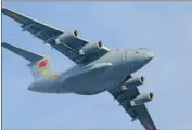  ?? Kin Cheung Associated Press ?? CHINESE Air Force transport planes have brought missiles to Belgrade for use by the Serbian military.