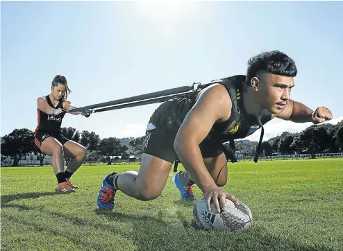  ?? Picture: Hagen Hopkins/Getty Images ?? New Zealand rugby and netball expect to get permission this week to resume matches. In preparatio­n for this, Hurricanes prop Xavier Numia and New Zealand netball player Marcelle Parkes train in isolation in Wellington. New Zealand has been in lockdown as long as SA, but could lift some restrictio­ns soon.