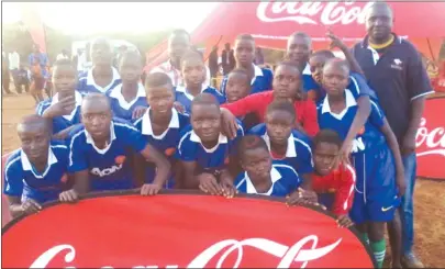  ??  ?? SMILE OF WINNERS . . . Players from Mamunyadza celebrate winning the 2017 Copa Coca-Cola Under-15 girls Manicaland finals over the weekend