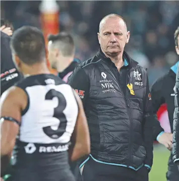  ??  ?? Port Adelaide coach Ken Hinkley at three-quarter time on Saturday night. Picture: SARAH REED