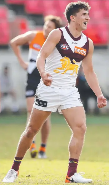  ?? Picture: MARK KOLBE/GETTY IMAGES ?? Territoria­n Zac Bailey celebrates one of his two goals during an impressive showing in Brisbane’s 20-point win over GWS yesterday.