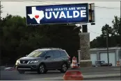  ?? ROGELIO V. SOLIS — THE ASSOCIATED PRESS ?? A vehicle passes an electronic billboard Thursday in Richland, Miss., that expresses support for the residents of Uvalde, Texas, in the wake of the deadly school shooting Tuesday.