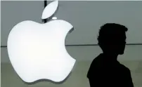  ?? — AP ?? Apple sued Qualcomm in a different lawsuit shortly after the Federal Trade Commission lodged its complaint.