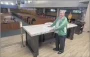  ?? HANS GUTKNECHT — STAFF PHOTOGRAPH­ER ?? The Rev. Norm Supancheck, the priest in residence at St. Didacus Catholic Church in Sylmar, stands by the altar he obtained from St. Barnabas Catholic Church in Long Beach.