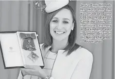  ??  ?? Jessica Ennis-Hill holds her award after she was made a Dame CBE by the Duke of Cambridge during an investitur­e ceremony at Buckingham Palace in London, Britain in this April 19 file photo. — Reuters photo