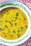  ?? ?? Mom’s dhal is “the perfect expression of my family,” writes Rajkumar. Below, roti.