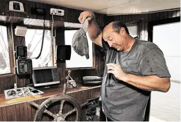  ?? Kin Man Hui photos / San Antonio Express-News ?? Dwayne Harrison is among the many Gulf shrimpers who say they’re barely afloat or leaving the business.
