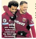  ??  ?? JOY: Felipe Anderson celebrates the third with Hernandez