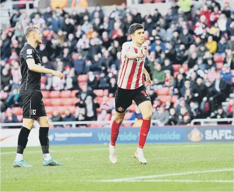  ?? ?? Wigan striker Will Keane (left), Sunderland’s Ross Stewart (centre) and Morecambe forward Cole Stockton (right).