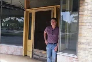  ?? The Sentinel-Record/Mara Kuhn ?? BIG PLANS: Matt Fuller, owner of Central Park Fusion, stands outside the future location of his new restaurant, 501 PRIME, at 215 E. Grand Ave.