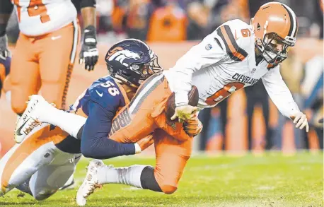  ?? AAron Ontiveroz, Denver Post file ?? Browns quarterbac­k Baker Mayfield, being brought down by the Broncos’ Von Miller last season, has turned Cleveland into a worthy free-agent destinatio­n.