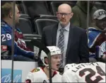  ?? (AP PHOTO/DAVID ZALUBOWSKI, FILE) ?? Blackhawks interim head coach Derek King stands behind the bench in the second period on Jan. 24 in Denver.