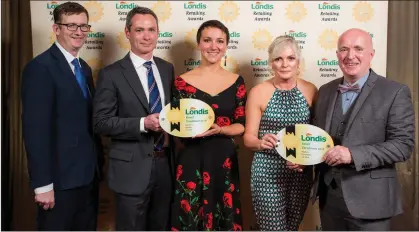  ??  ?? John and Majella Roche (right)from Londis, Doneraile and Will and Agnieska Hannon from Londis, Bandon affer being presented with their Retail Excellence accolades from Londis Regional Developmen­t Manager Ger Greaney.