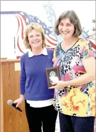  ?? LYNN KUTTER ENTERPRISE-LEADER ?? Mary Jane Silva, right, was named 2017 Citizen of the Year by the Farmington Area Chamber of Commerce. Chamber board member Diane Bryant presents the plaque to Silva, who started the Farmington Back to School Bonanza.