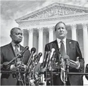  ?? MANDEL NGAN/GETTY-AFP ?? Most states are with D.C. Attorney General Karl Racine, left, and Texas Attorney General Ken Paxton in the probe.