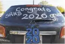  ?? SUSAN WALSH/AP ?? A car is decorated to celebrate the South River High School Class of 2020 during a family parade in Edgewater on April 20.