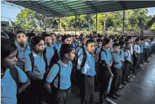  ?? ADRIANA LOUREIRO FERNANDEZ FOR THE NEW YORK TIMES ?? Some children won’t go to school unless they know there is food there. Students at the Augusto D’Aubeterre Lyceum school in Boca de Uchire.