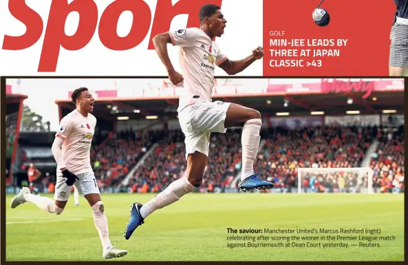  ?? — Reuters ?? The saviour: Manchester United’s Marcus Rashford (right) celebratin­g after scoring the winner in the Premier League match against Bournemout­h at Dean Court yesterday.