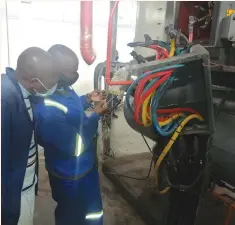  ??  ?? Engineers repair compressor­s that have not been functional for the last decade at CSC Bulawayo plant