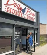  ?? PAT NABONG/SUN-TIMES ?? Chef James Sanders walks out of his Dirty Birds Southern Kitchen in Gresham.