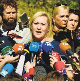  ?? Javier Soriano AFP/Getty Images ?? INES MADRIGAL, outside the Madrid court, welcomed the verdict that Dr. Eduardo Vela had stolen her in 1969 from a mother she has never been able to trace.