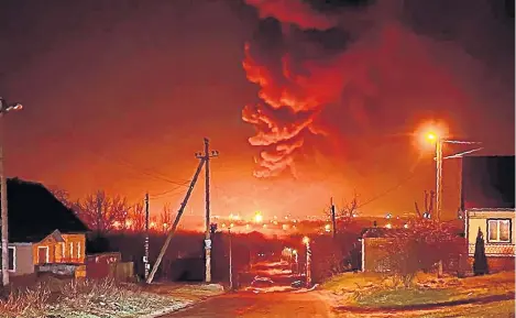  ?? ?? Smoke and flames from oil storage facilities hit by fire in Bryansk, Russia, yesterday.