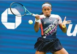  ?? TIMOTHY A. CLARY/GETTY-AFP ?? Coco Gauff hits a forehand during her victory Sunday at the U.S. Open. The 18-year-old Gauff made the quarterfin­als of the tournament for the first time.