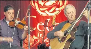  ??  ?? Colin Grant and Scott Macmillan complete a sound check at a Celtic Colours show in St. Peter’s. SUBMITTED PHOTO