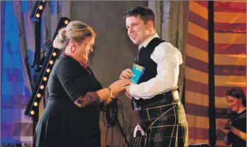  ??  ?? Calum Bennett receives his Young Ambassador of the Year Award and, below, Ian Irvine and Tracey Peedle, co-owners of the Ben Cruachan Inn, with their New Business Award.