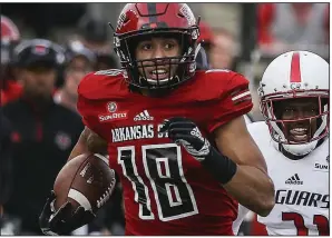  ??  ?? Arkansas Democrat-Gazette/MITCHELL PE MASILUNArk­ansas State wide receiver Justin McInnis, who has caught 56 passes for 694 yards and 5 touchdowns, is among a group of seniors who will be playing in their final game for the Red Wolves today as they take on Nevada in the Arizona Bowl.