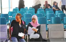  ?? AFP ?? Palestinia­ns wait at the Erez border post with Israel near Beit Hanoun in Gaza Strip yesterday.