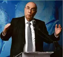  ?? Evaristo Sá/AFP ?? Henrique Meirelles discursa após se filiar ao MDB