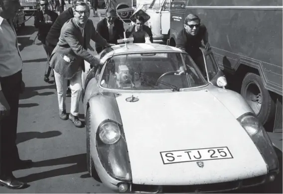  ??  ?? Below: Ready for live outside broadcast, Porsche 904 (#904 009) at the 1000km race at the Nürburgrin­g in 1966. The car was registered by ZDF Wiesbaden. Left to right: Huschke von Hanstein, Rainer Günzler, Günter Klass and Paul Frère