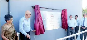  ?? ?? Unveiling of the plaque at the new Cargills Distributi­on Centre in Kattana by Mr. Louis Page, Group Chairman under the invitation of Mr. Imtiaz Wahid, Managing Director, Cargills (Ceylon) PLC.