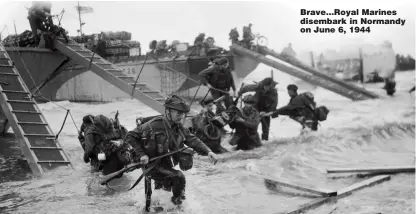  ??  ?? Brave...Royal Marines disembark in Normandy on June 6, 1944