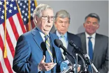  ??  ?? Senate Majority Leader Mitch McConnell of Ky., speaks to reporters June 9 following the weekly Republican policy luncheon on Capitol Hill in Washington. Sen. Roy Blunt, R-Mo., center, and Sen. Cory Gardner, R-Colo., right, listen. [SUSAN WALSH/ASSOCIATED PRESS FILE PHOTO]