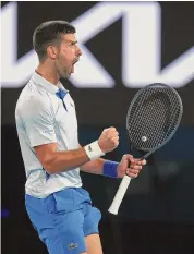  ?? Julian Finney/Getty Images ?? Novak Djokovic celebrates during a fourth-round singles match against Adrian Mannarino on Sunday.