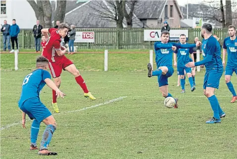  ??  ?? Louis Appere confidentl­y strikes home Broughty Athletic’s winning goal against Forfar West End.