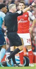  ??  ?? Arsenal’s Granit Xhaka is sent off by referee Jonathan Moss during Saturday’s English Premier League match at the Emirates Stadium. –