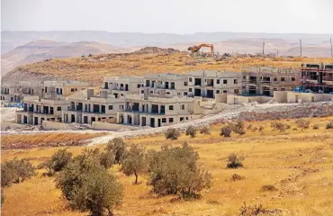  ?? (AFP) ?? This file photo shows new houses under constructi­on in the Nokdim settlement in the Israeli occupied West Bank, on October 13 last year