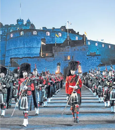  ?? Pictures: Getty Images and Kris Miller. ?? Clockwise from left: the spectacle of the Edinburgh Military Tattoo; a detail of the SCOTS DG uniform; the unit’s Brit Award and a close-up of pipes.