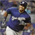  ?? ERIC ESPADA / GETTY IMAGES ?? Jesus Aguilar of the Milwaukee Brewers singles Wednesday night against the Miami Marlins. He’s tied for the NL lead with 23 home runs and is the fourth Milwaukee player headed to the All-Star Game.