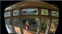  ?? PHOTO: JOSEPH JOHNSON/STUFF ?? Deborah Buchanan walks across her flooded section at her house on Clarendon Tce yesterday.