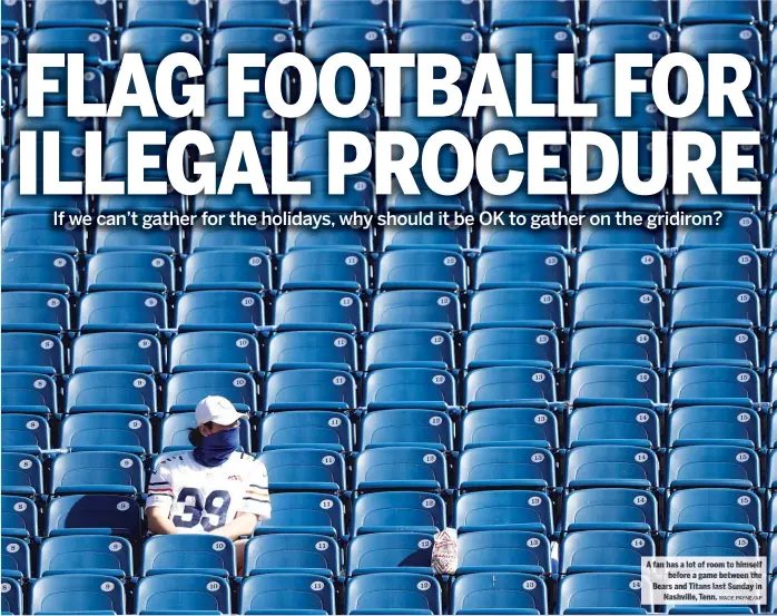  ?? WADE PAYNE/ AP ?? A fan has a lot of room to himself before a game between the Bears and Titans last Sunday in Nashville, Tenn.