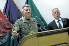  ?? JONATHAN ERNST/GETTY IMAGES ?? U.S. Defence Secretary Jim Mattis, right, and U.S. Army Gen. John Nicholson hold a news conference in Kabul, Afghanista­n, on Monday. Mattis says the U.S. will have to confront Russia where it is breaking internatio­nal law.