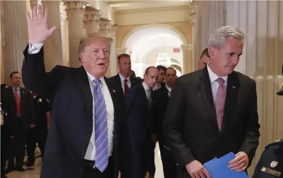  ?? Ap File ?? ET TU, BRUTE? Donald Trump walks with Kevin McCarthy while leaving the U.S. Capitol on June 19, 2018.