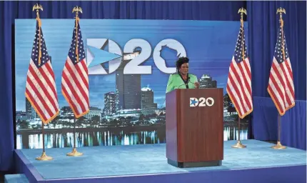  ?? MIKE DE SISTI / MILWAUKEE JOURNAL SENTINEL ?? U.S. Rep. Gwen Moore (D-Wis.) speaks at the start of the Democratic National Convention at the Wisconsin Center on Monday. Moore spoke from a second-floor conference room, which was turned into a studio to kick off a mostly virtual convention due to the COVID-19 pandemic.