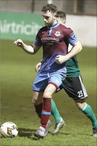  ??  ?? Drogheda goalscorer Lee Duffy holds off Derry City’s Ben Doherty.
